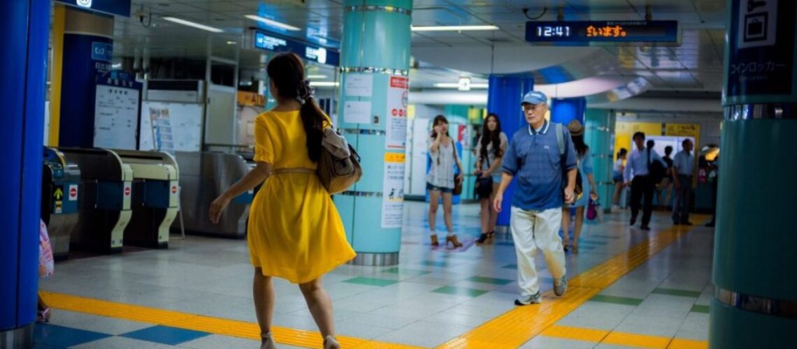 Lukasz Palka Tokyo Metro woman in yellow dress